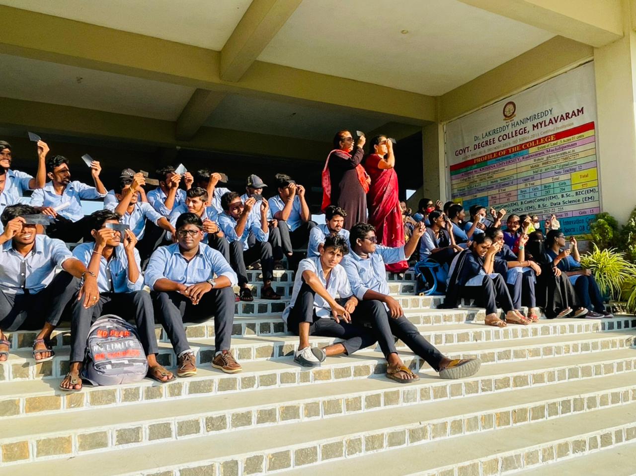 SOLAR ECLIPSE WATCHED Students watched the Solar Eclipse with filtered film medium and are explained the astronomical phenomenon
